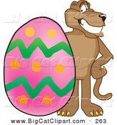 Big Cat Cartoon Vector Clipart of a Grinning Cougar Mascot Character with an Easter Egg by Mascot Junction