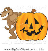 Big Cat Cartoon Vector Clipart of a Happy Cougar Mascot Character with a Pumpkin by Mascot Junction