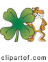 Big Cat Cartoon Vector Clipart of a Happy Tiger Character School Mascot with a Clover by Toons4Biz