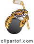 Big Cat Cartoon Vector Clipart of a Mean Tiger Character School Mascot Grabbing a Hockey Puck by Mascot Junction