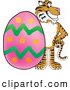 Big Cat Cartoon Vector Clipart of a Grinning Tiger Character School Mascot with an Easter Egg by Mascot Junction